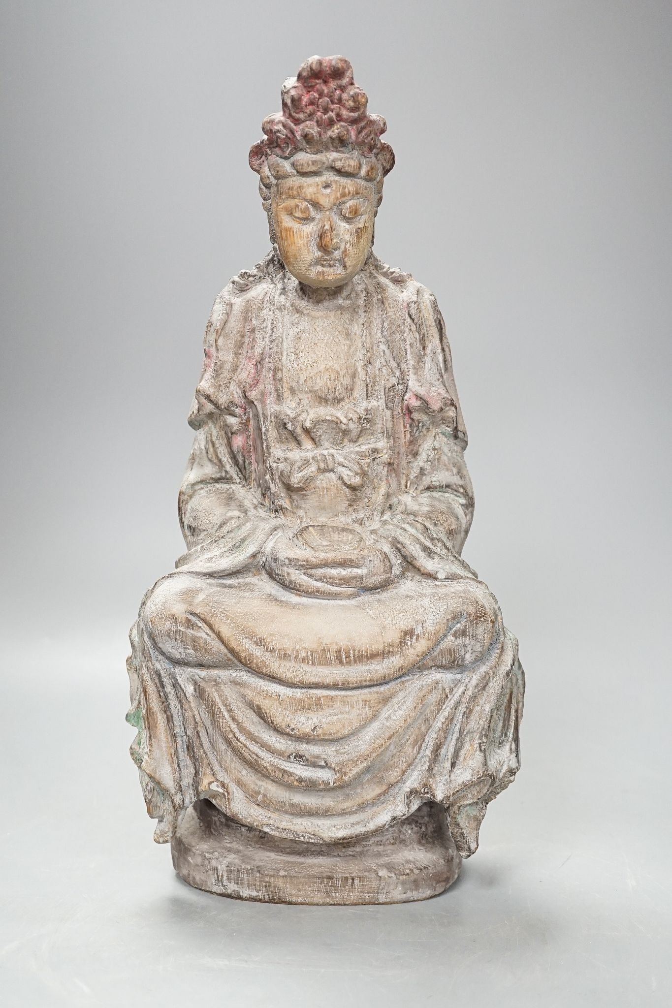 A Chinese carved wood figure of Guanyin, 35cm